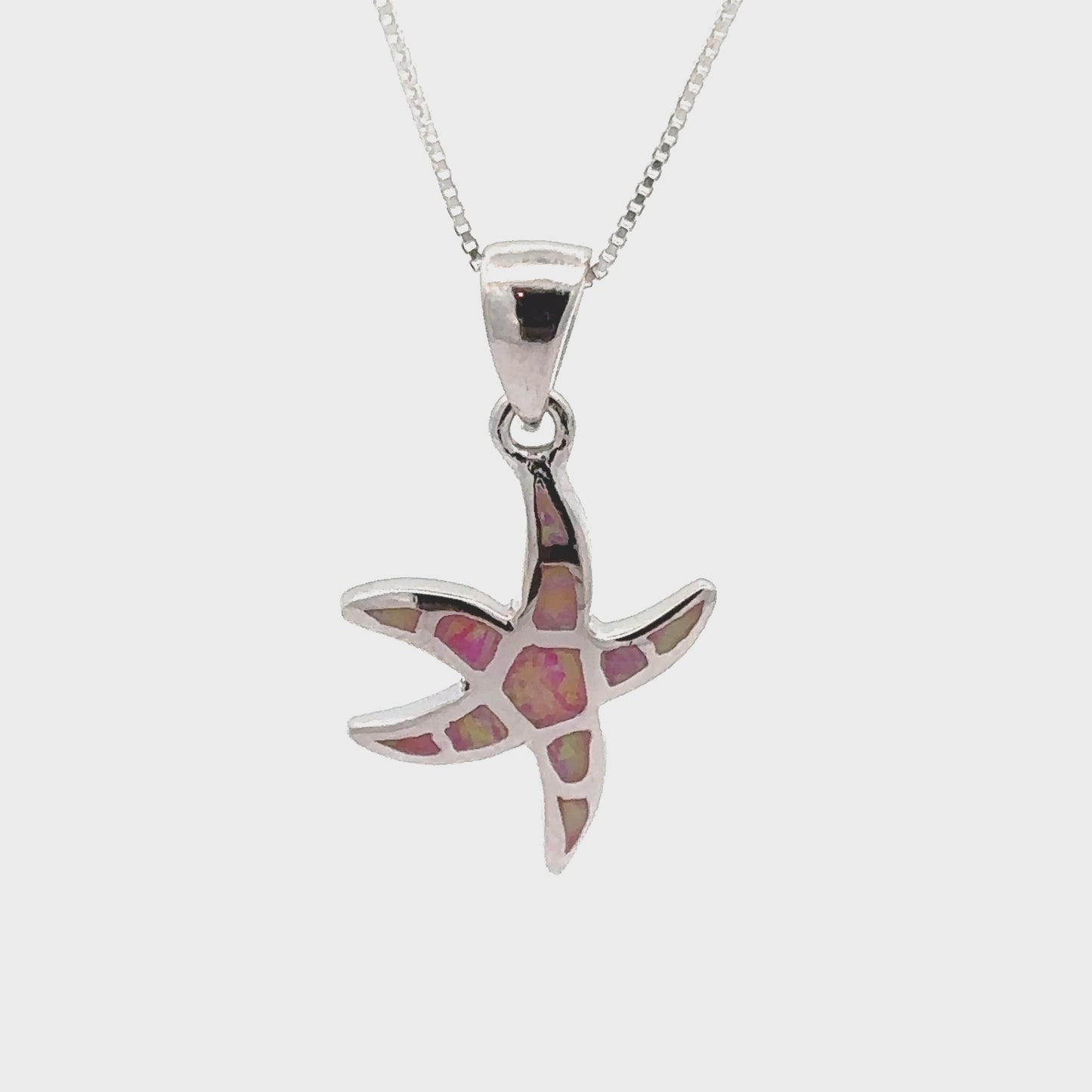 
                  
                    Load and play video in Gallery viewer, Lab-Created Opal Sea Star Pendant
                  
                