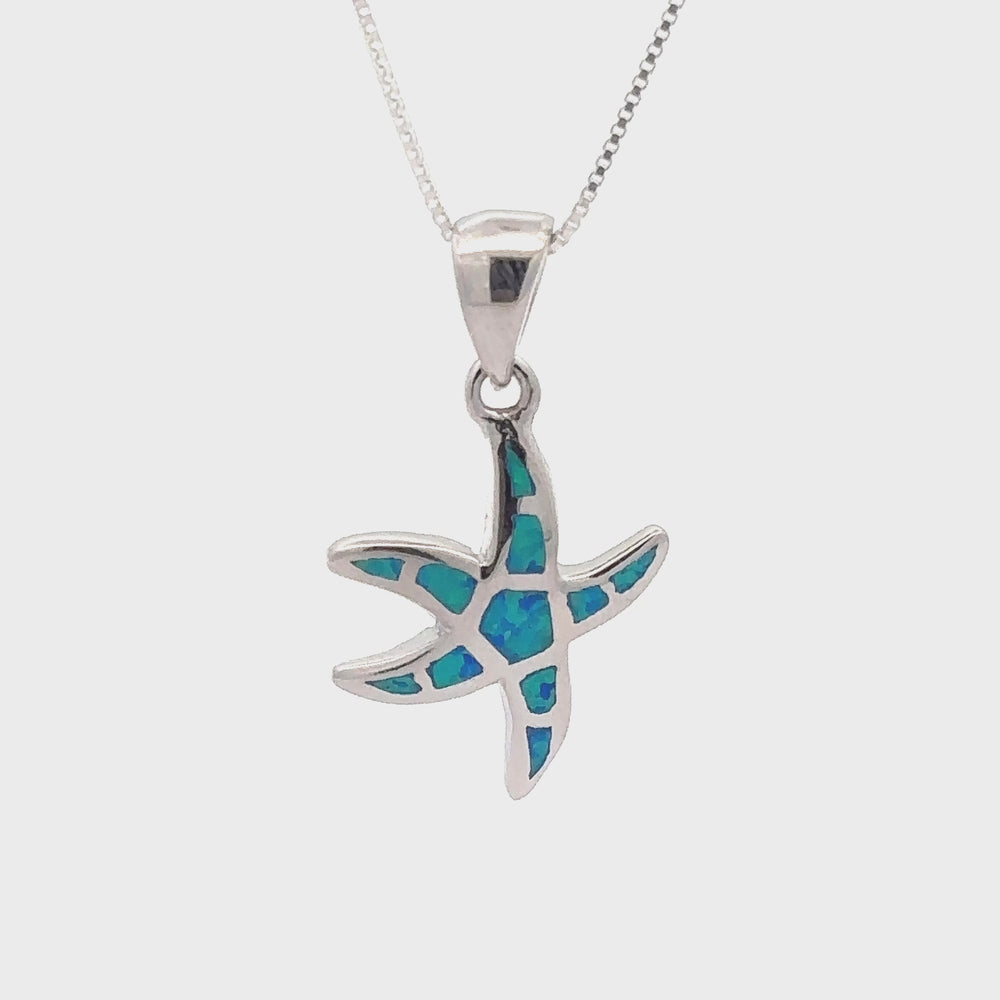 
                  
                    Load and play video in Gallery viewer, Lab-Created Opal Sea Star Pendant
                  
                