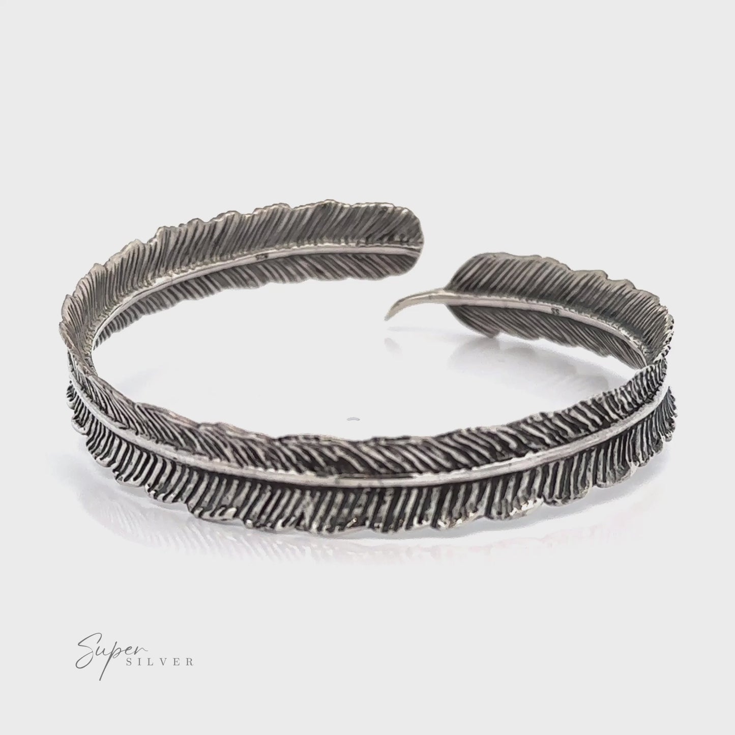 
                  
                    Load and play video in Gallery viewer, Oxidized Feather Cuff Bracelet
                  
                