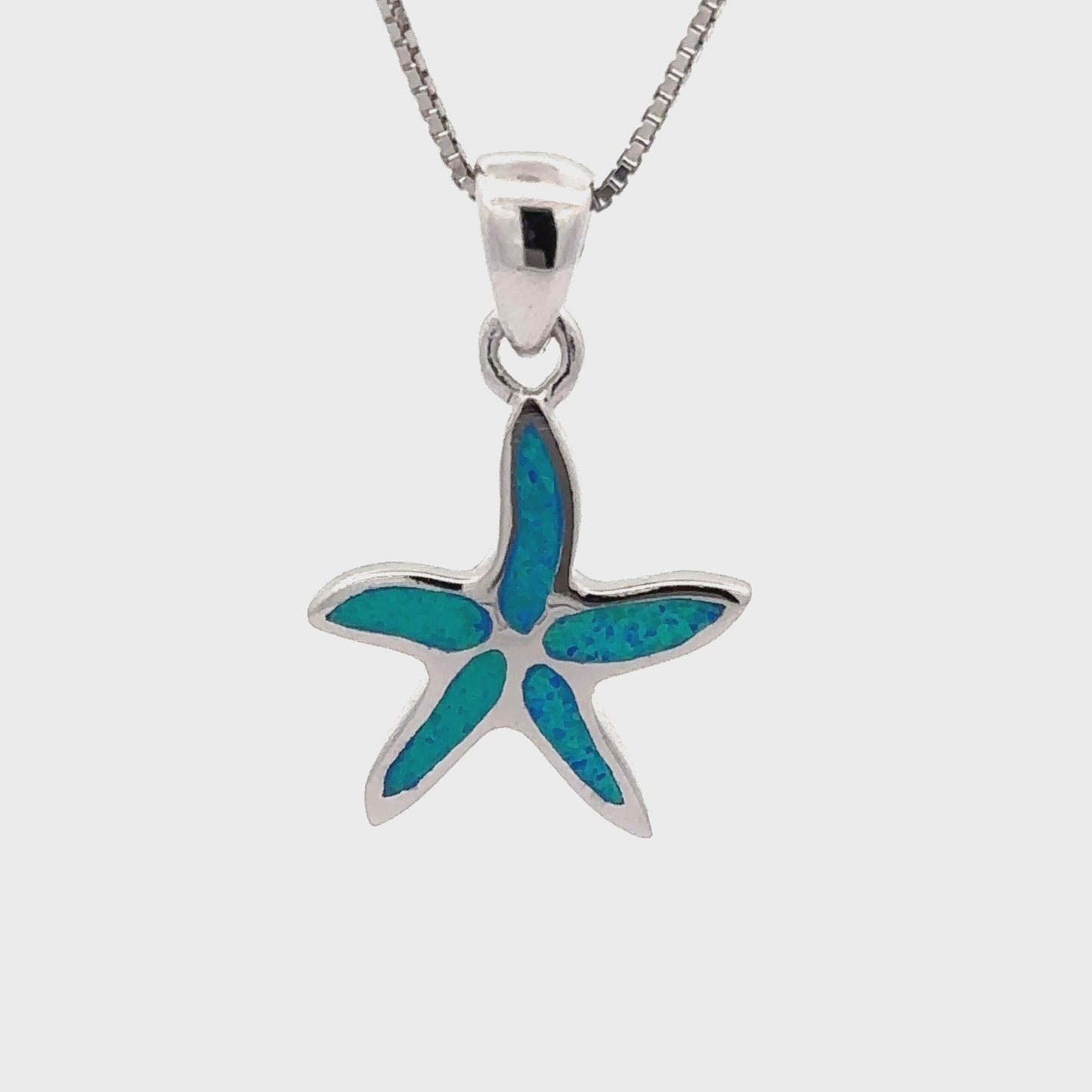 
                  
                    Load and play video in Gallery viewer, Lab-Created Opal Sea Star Pendant
                  
                