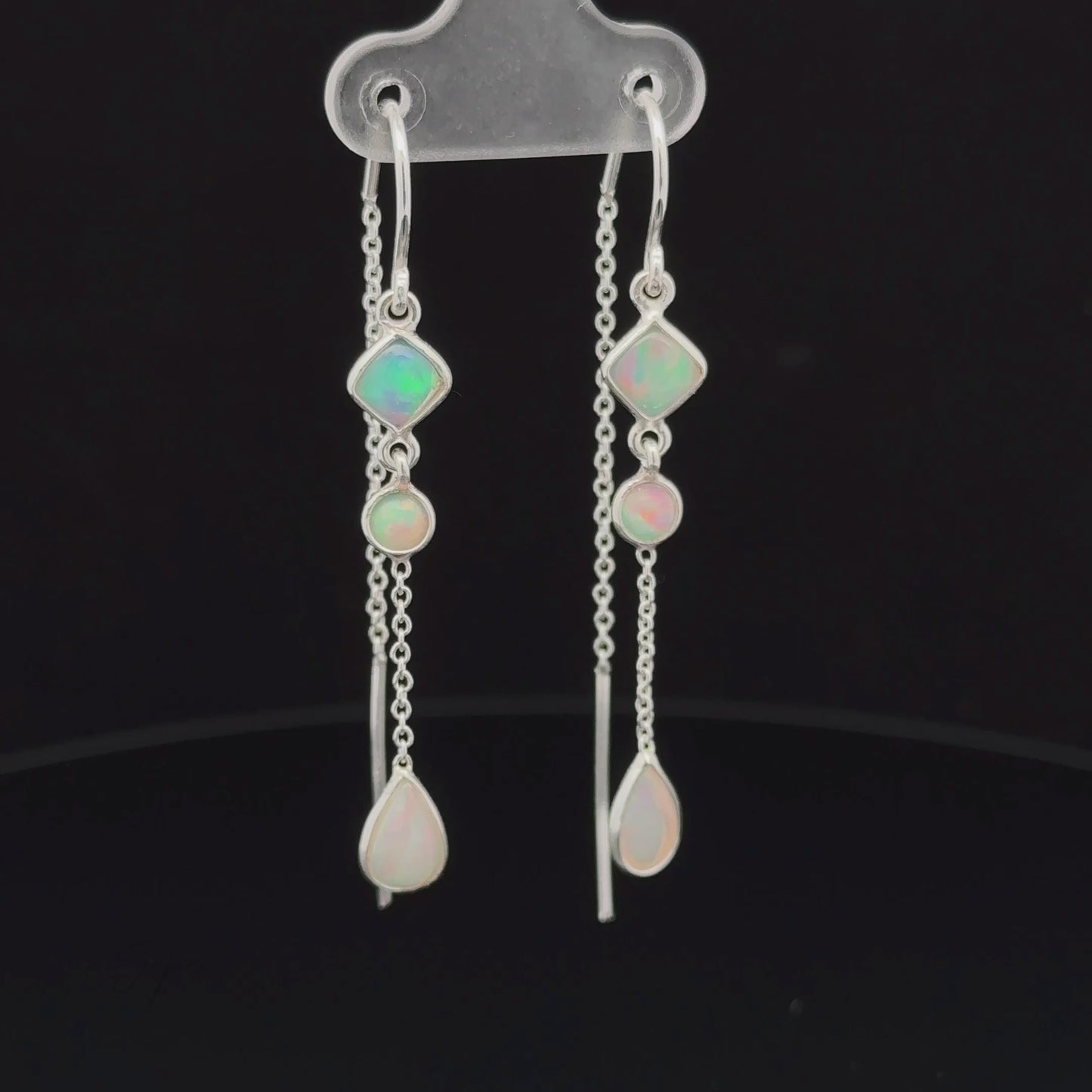 
                  
                    Load and play video in Gallery viewer, Ethiopian Opal Threader Earrings
                  
                