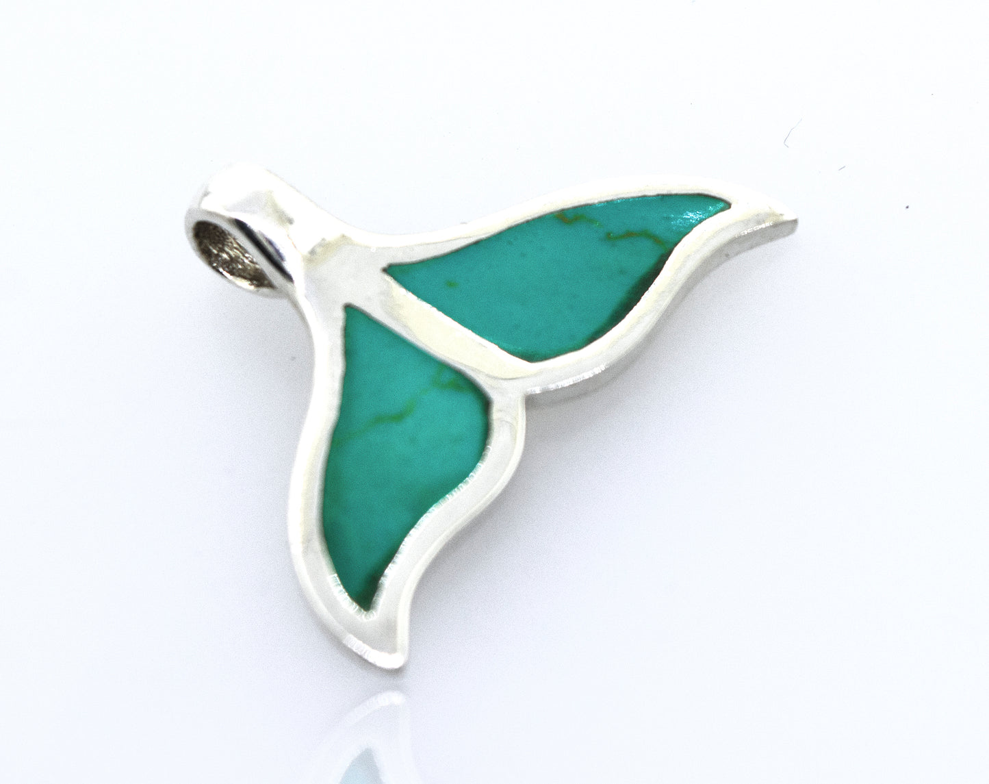 
                  
                    This Inlay Whale Tail Pendant from Super Silver features an exquisite turquoise stone.
                  
                
