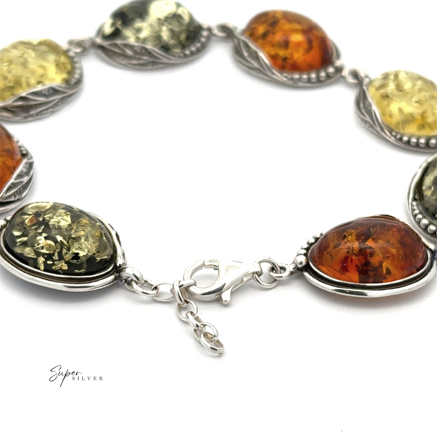 
                  
                    The Oval Amber Link Bracelet With Leaf Detail showcases classic elegance with its silver design, featuring oval-shaped Baltic amber stones in assorted colors and secured with a lobster clasp.
                  
                