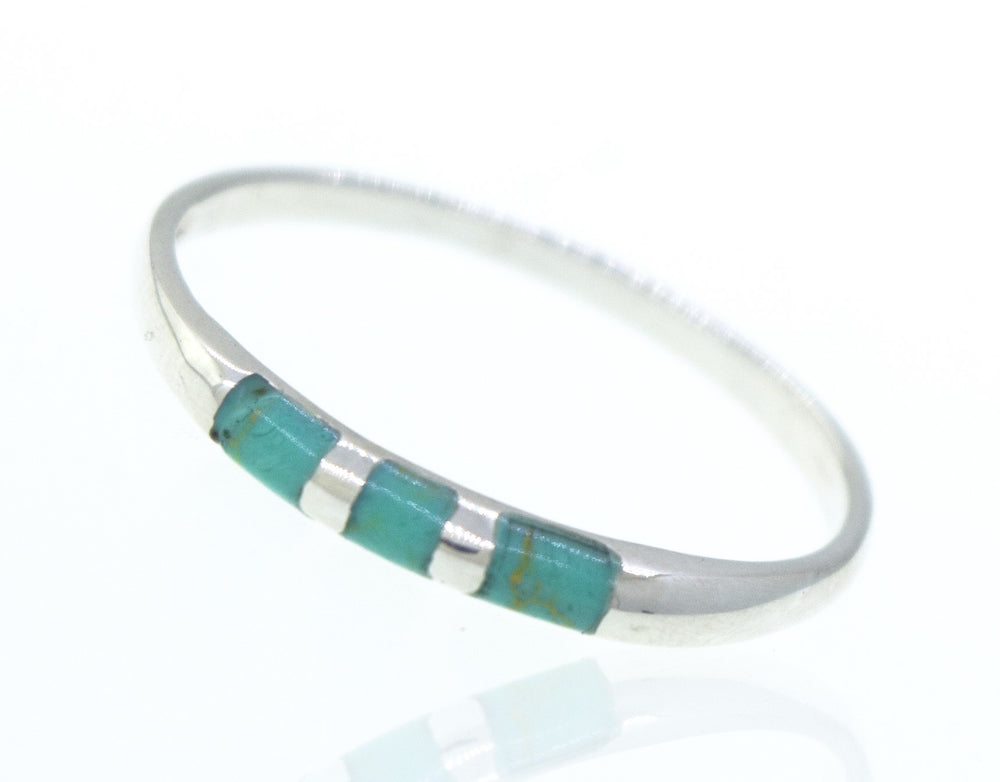 A Striped Turquoise Ring crafted from .925 silver.