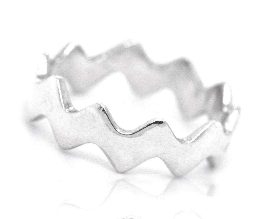 A durable and stylish Modern Zig-Zag Ring with a zig zag pattern.