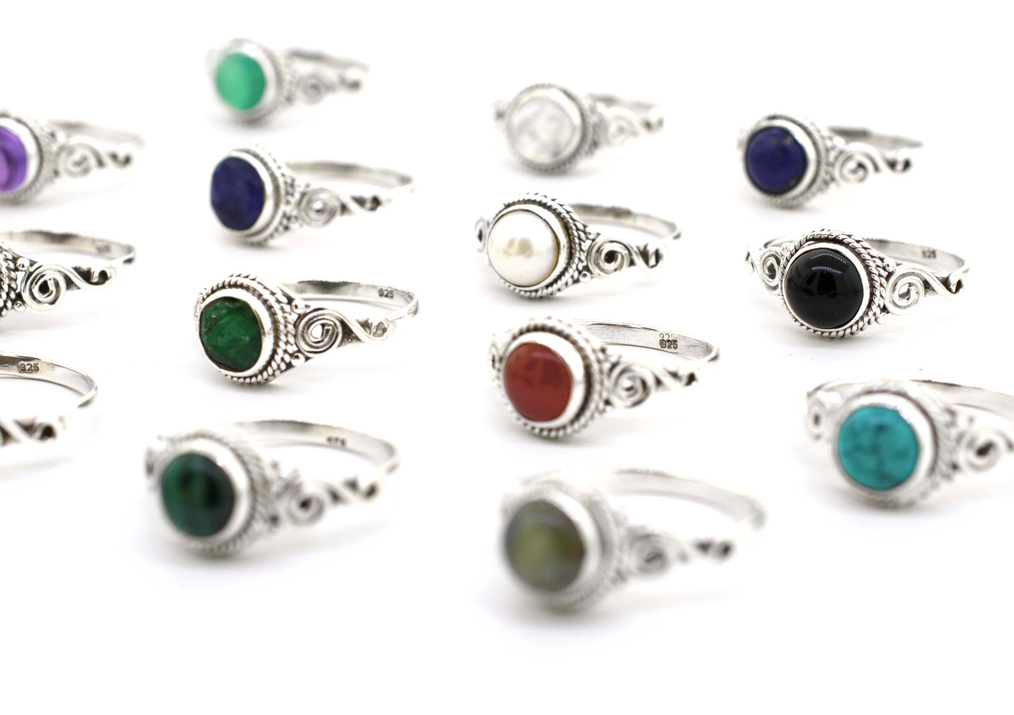 A boho-inspired Gemstone Circle Ring With Rope Border And Swirl Design featuring different colored stones.