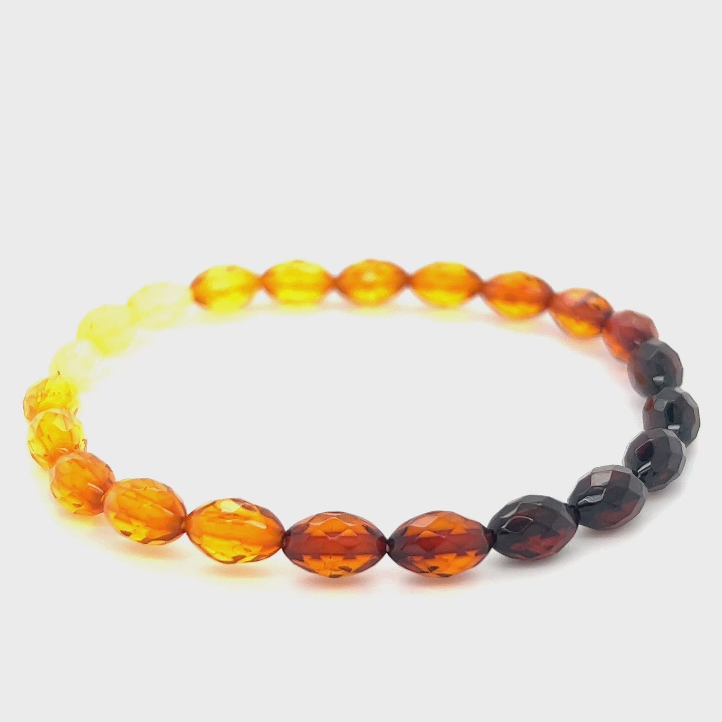 
                  
                    Load and play video in Gallery viewer, Faceted Baltic Amber Stretch Bracelet
                  
                
