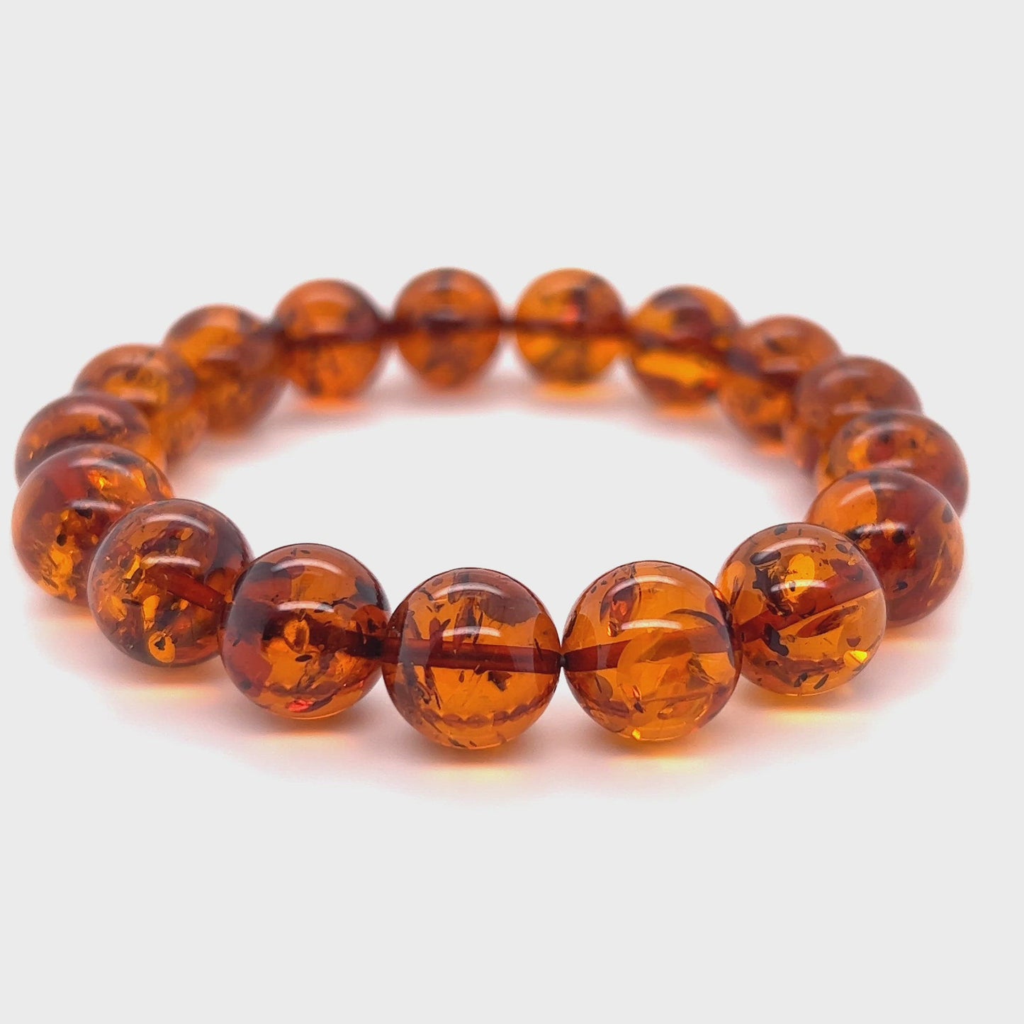 
                  
                    Load and play video in Gallery viewer, Captivating Classic Amber Bead Bracelet
                  
                