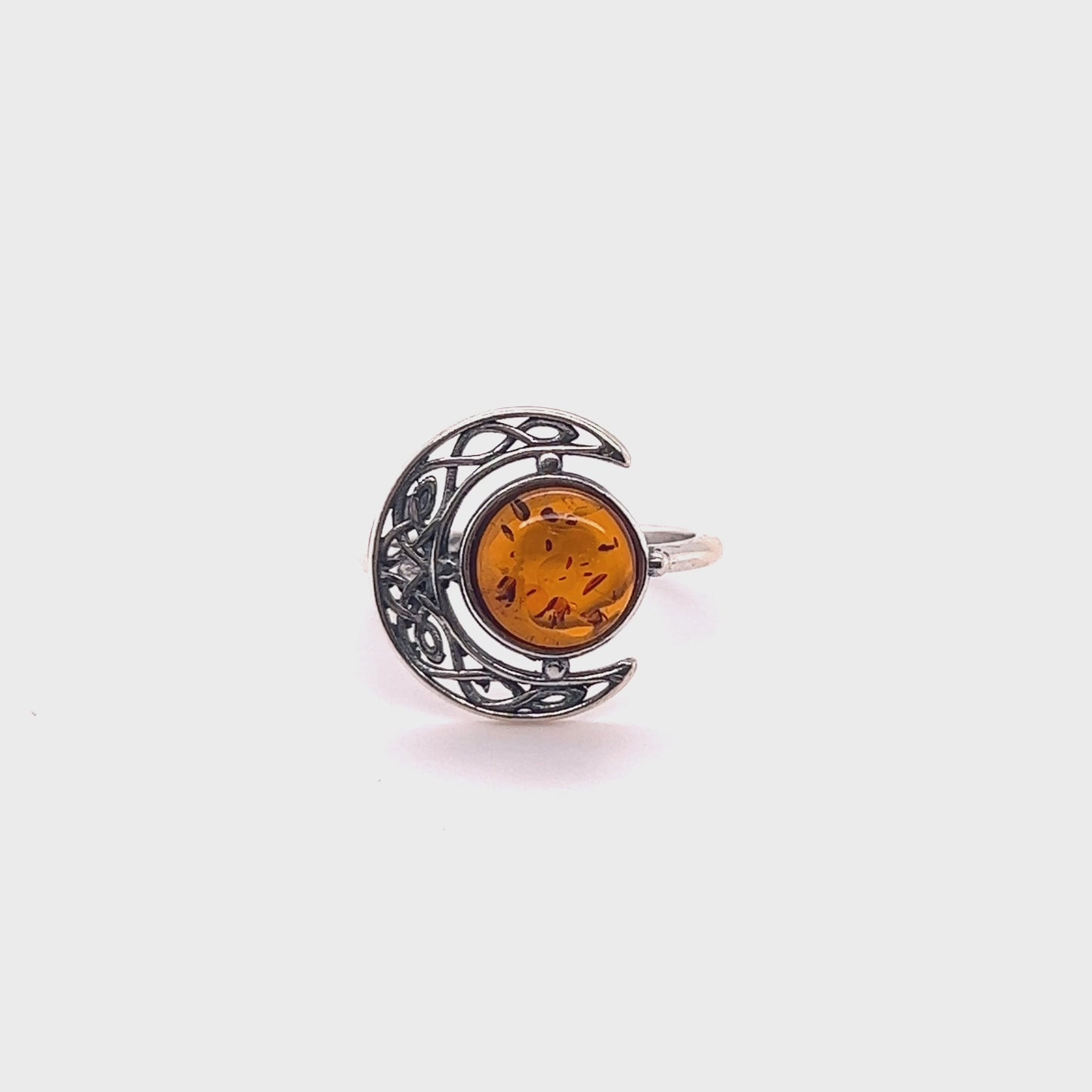 
                  
                    Load and play video in Gallery viewer, Celtic Amber Crescent Moon Ring
                  
                