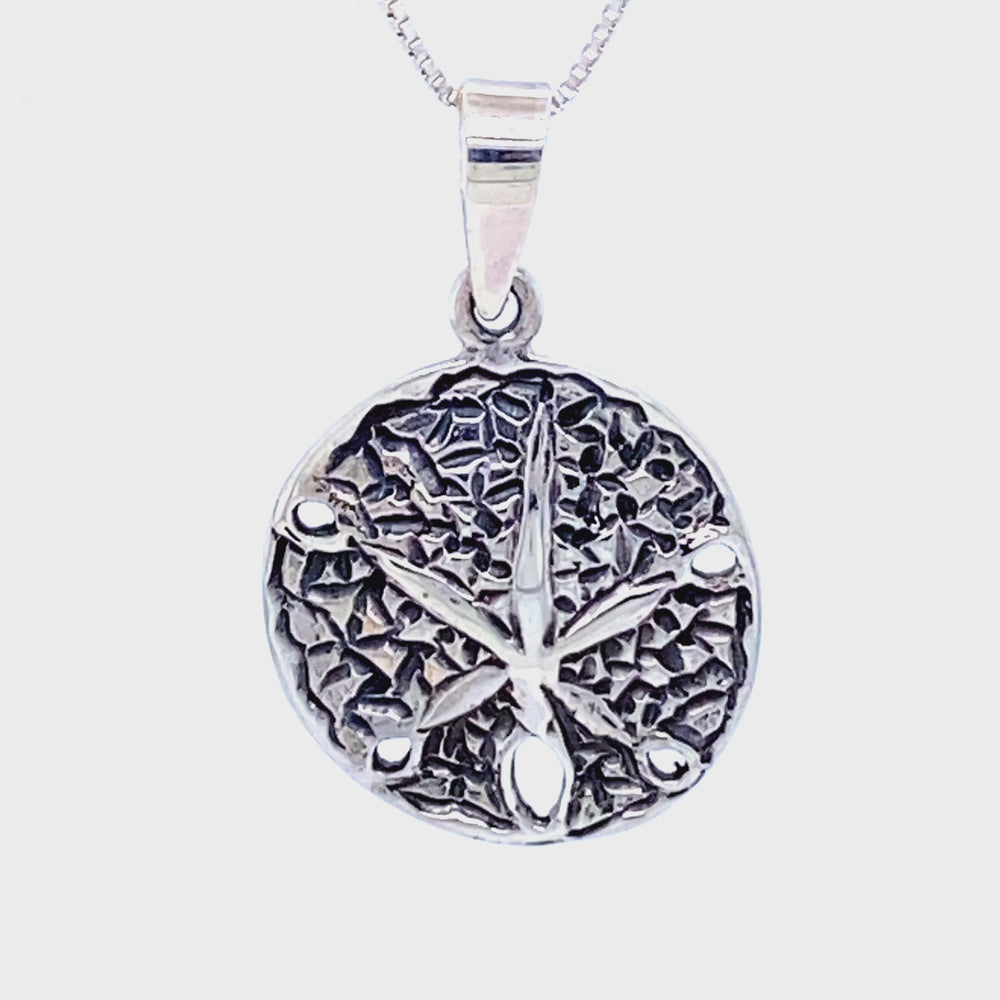 
                  
                    Load and play video in Gallery viewer, Sand Dollar Pendant with Textured Finish
                  
                