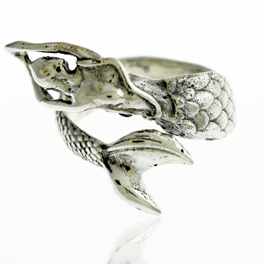 
                  
                    A Sterling Silver Adjustable Mermaid Ring on an ocean surface in Santa Cruz.
                  
                