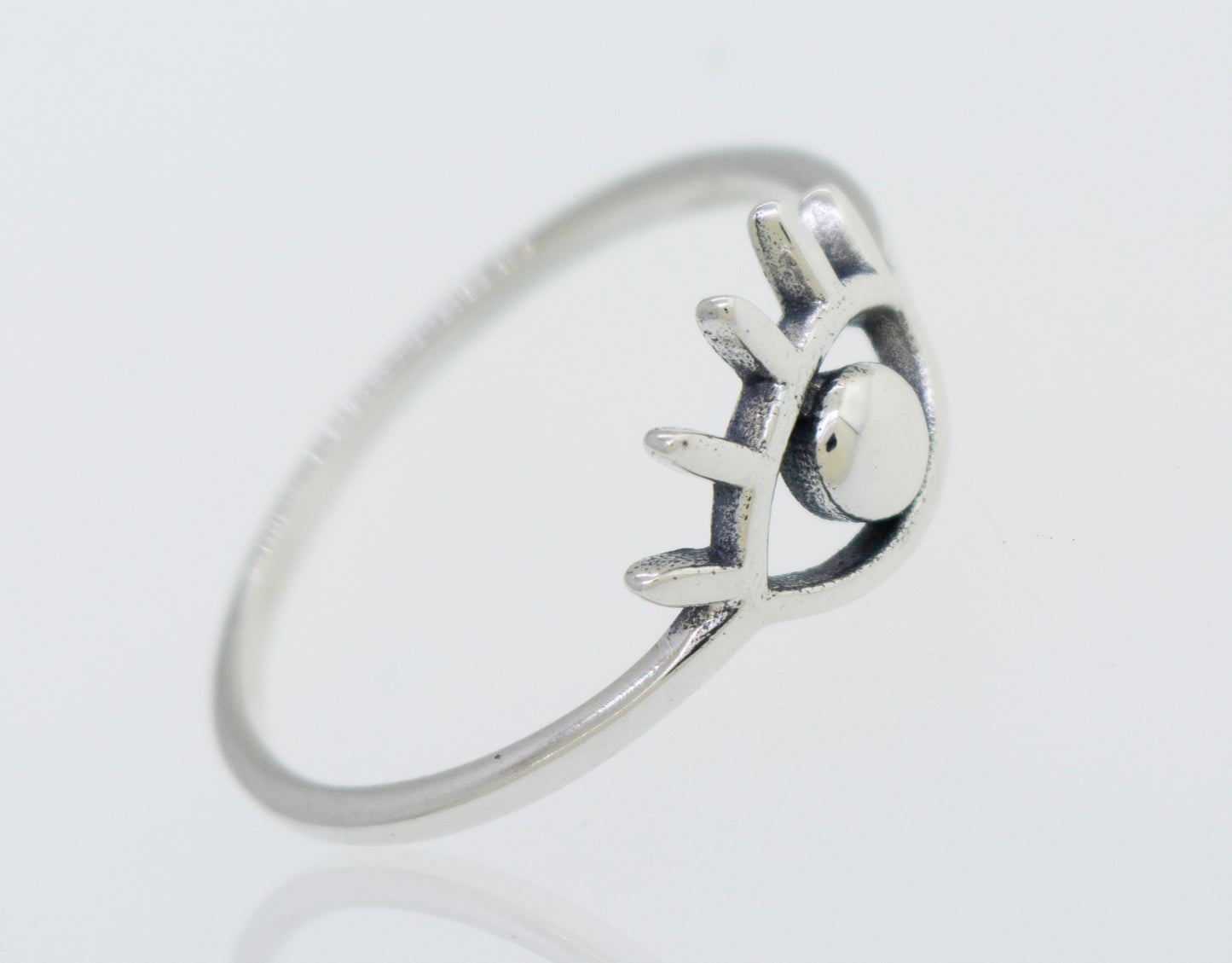 
                  
                    A minimalist All Seeing Evil Eye Ring in sterling silver.
                  
                