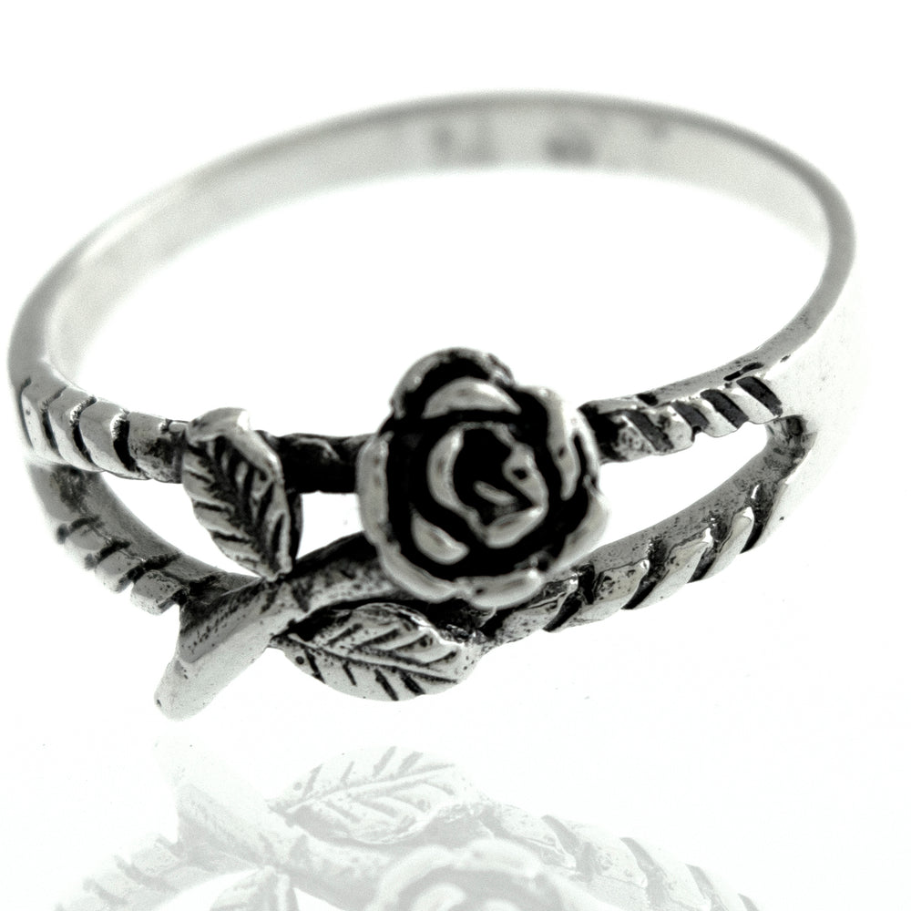 
                  
                    A Sterling Silver Rose Ring with a delicate rose design, inspired by nature's beautiful flowers.
                  
                