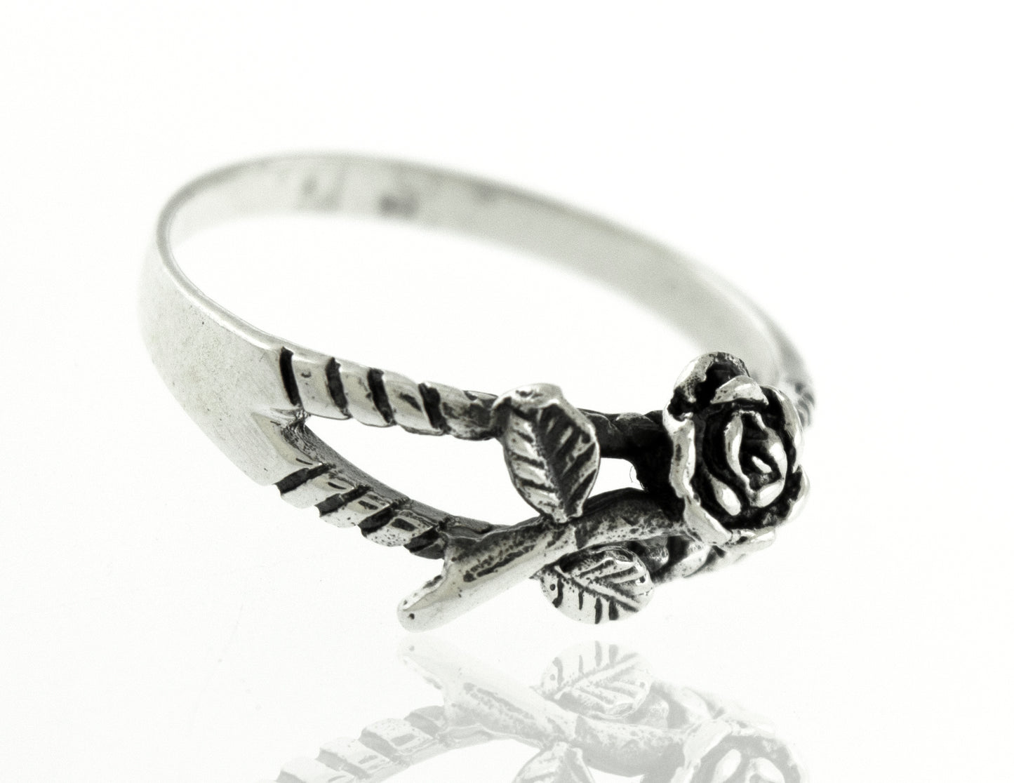 
                  
                    A boho Sterling Silver Rose Ring with a floral rose and leaves design.
                  
                