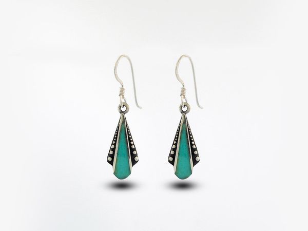 A pair of Super Silver Turquoise Teardrop Shaped Bali Inspired Earrings with turquoise and black stones.