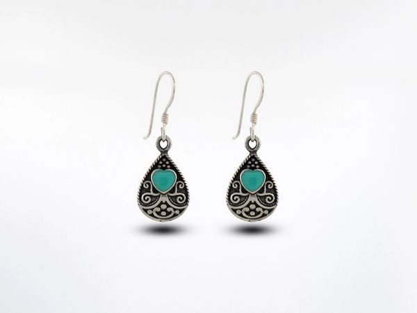 These Super Silver Bali Style Teardrop Earrings with Heart shaped Turquoise Stone feature striking turquoise stones, all crafted from sterling silver.