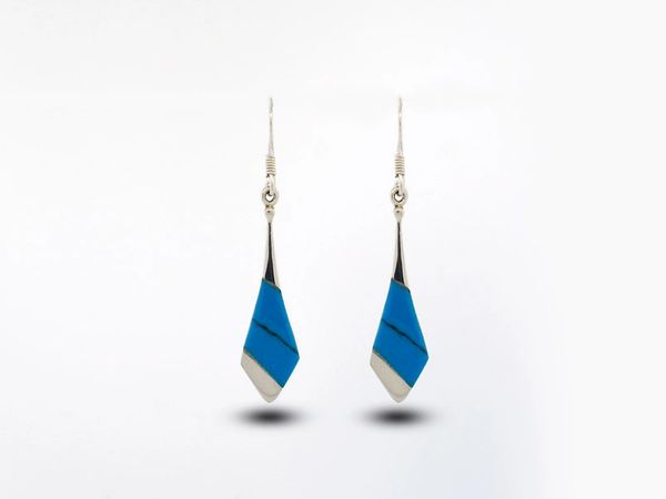 A pair of Super Silver Blue Turquoise Tie Shaped Earrings on a white background.