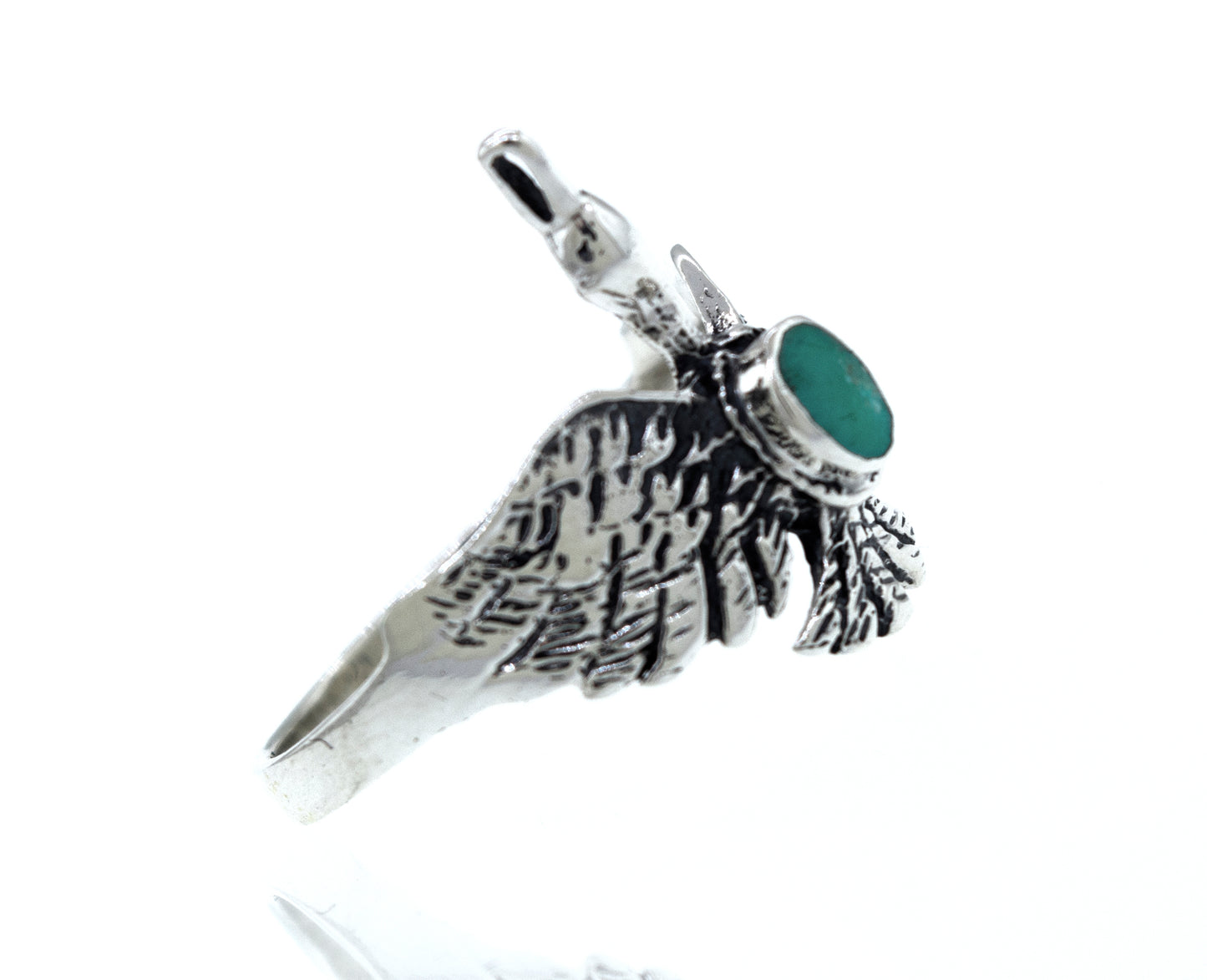 
                  
                    A Swan Ring with Inlay Stone in silver, inspired by nature.
                  
                