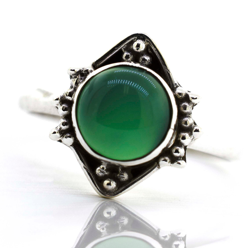 
                  
                    A Round Gemstone Ring With Oxidized Diamond Shape Pattern from Super Silver with a green jade gemstone.
                  
                