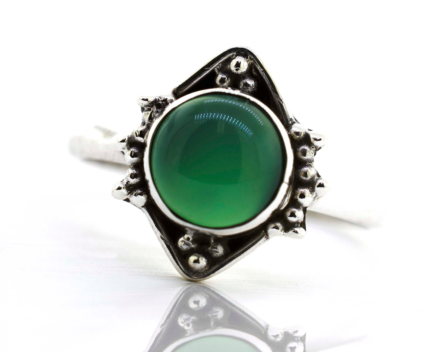
                  
                    A Round Gemstone Ring With Oxidized Diamond Shape Pattern from Super Silver with a green jade gemstone.
                  
                