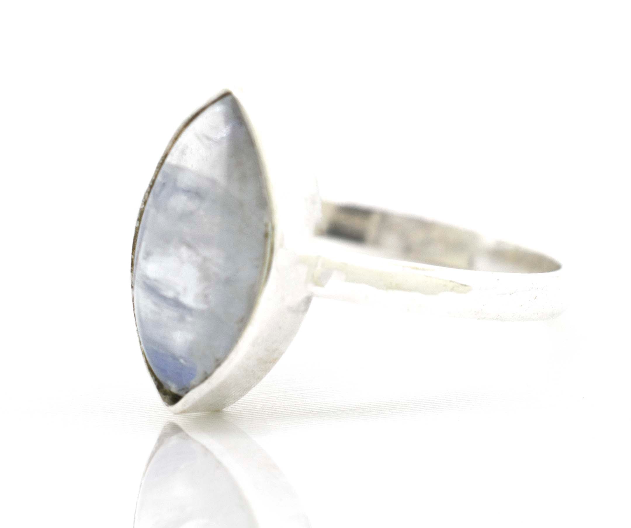 A Super Silver Simple Marquise Shaped Gemstone Ring with a gemstone in the middle.