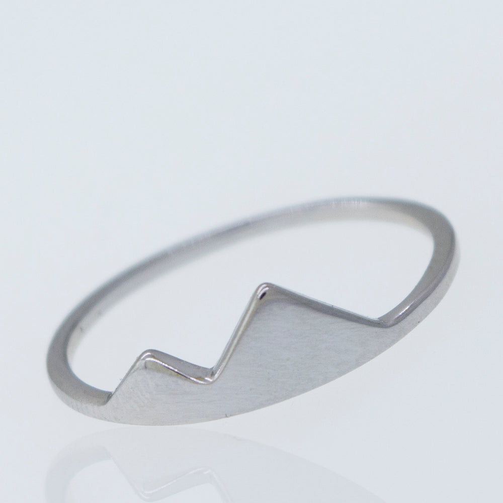 A Super Silver Silver Mountain Ring with a mountain design on it.