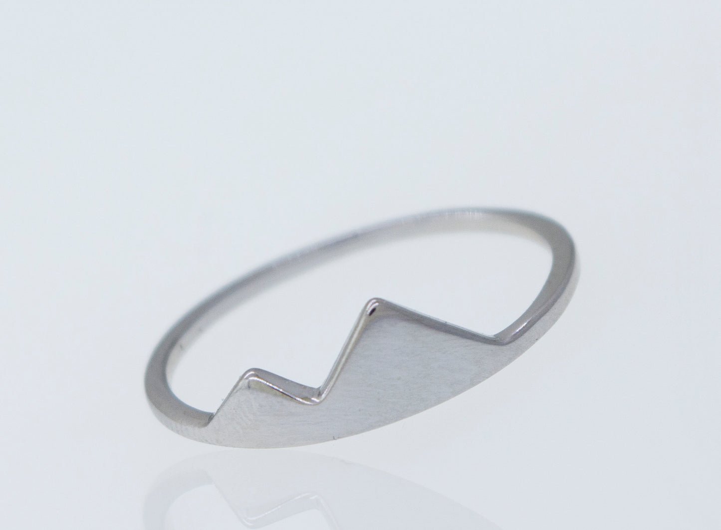 A Super Silver Silver Mountain Ring with a mountain design on it.