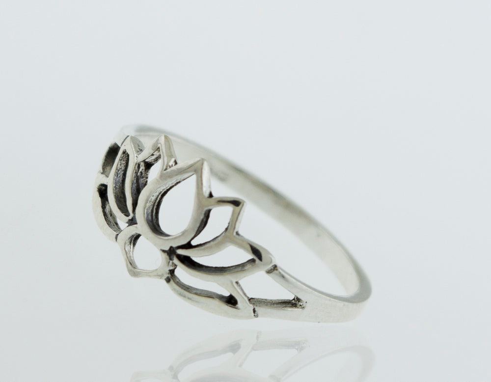 A minimalist Delicate Lotus Outline Ring with a lotus flower design.