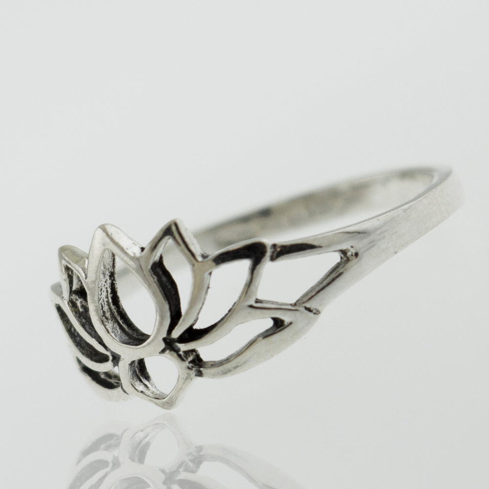 A Delicate Lotus Outline Ring with a lotus flower design, inspired by nature's beauty.