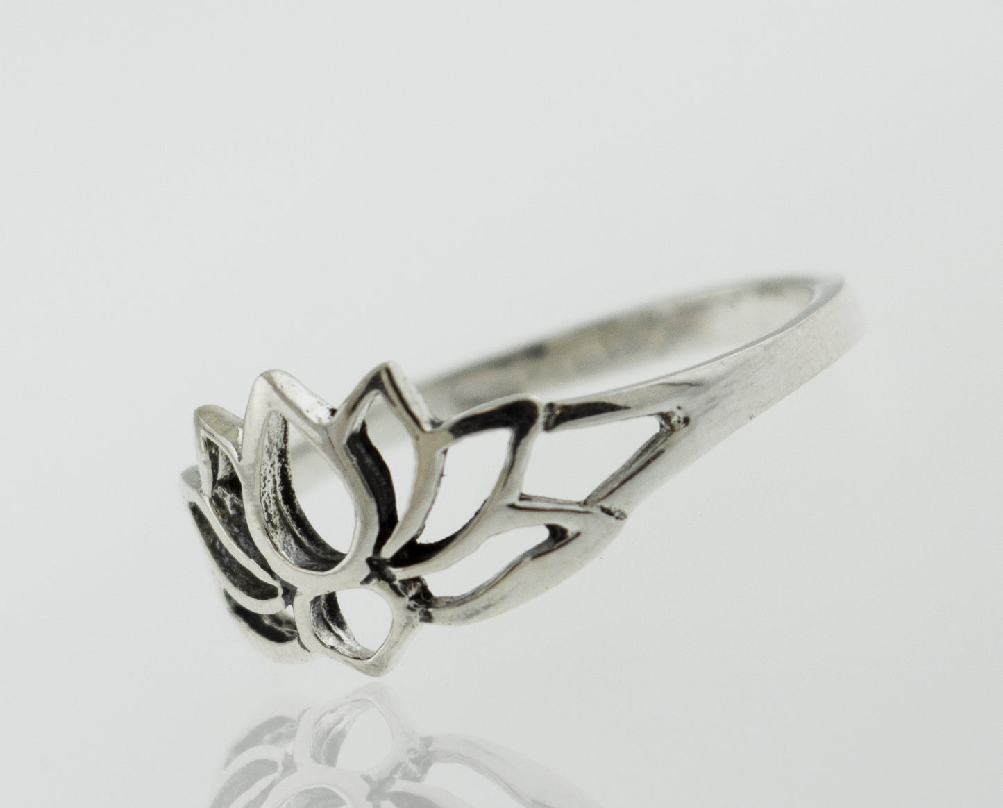 A Delicate Lotus Outline Ring with a lotus flower design, inspired by nature's beauty.