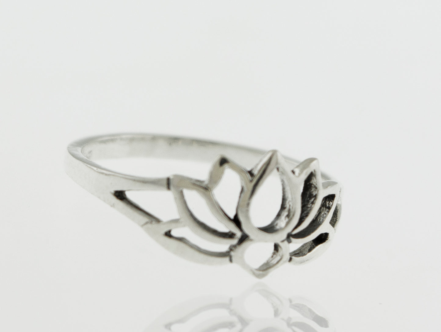 
                  
                    A minimalist Delicate Lotus Outline Ring featuring a delicate lotus flower design, inspired by nature.
                  
                