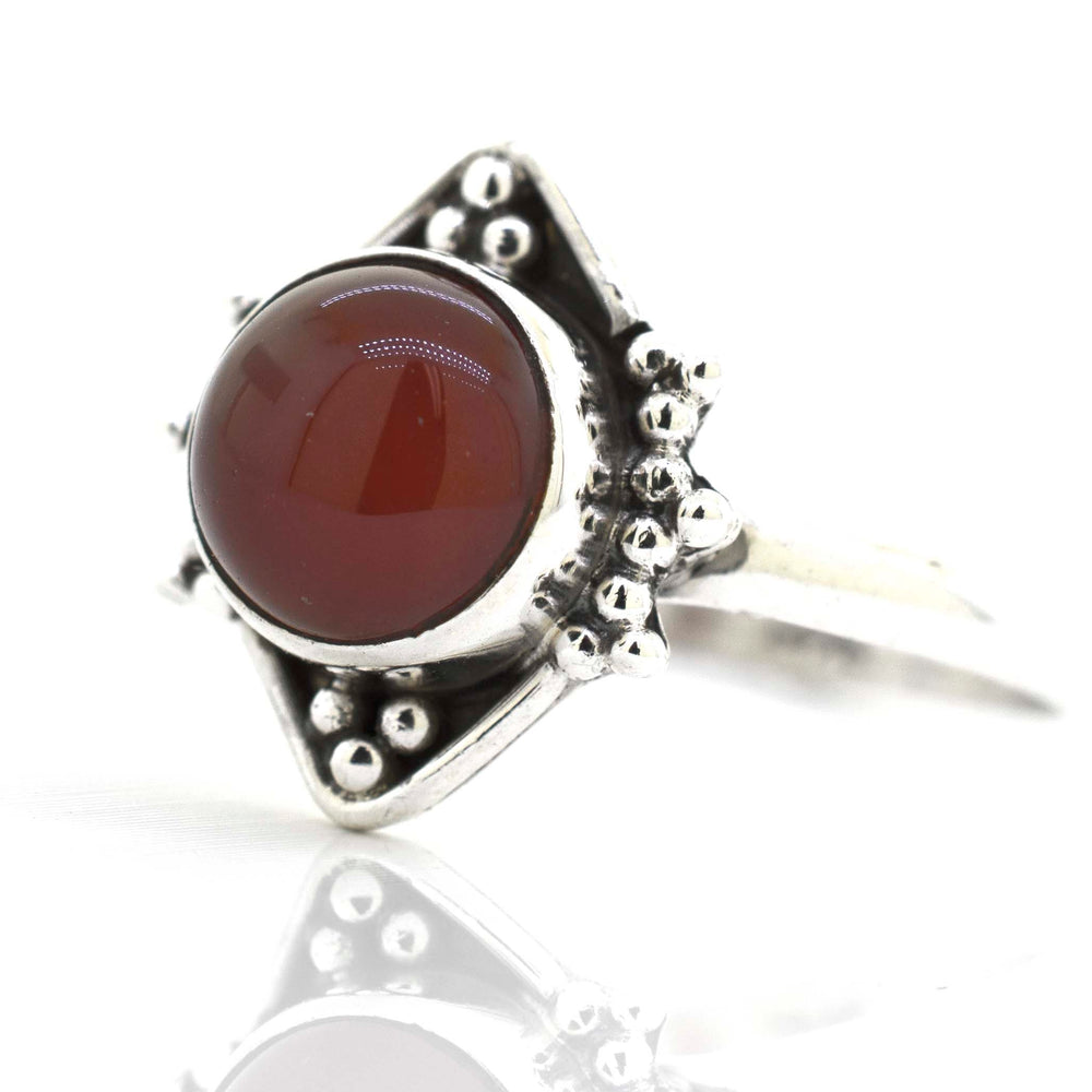 
                  
                    A Round Gemstone Ring With Oxidized Diamond Shape Pattern from Super Silver.
                  
                