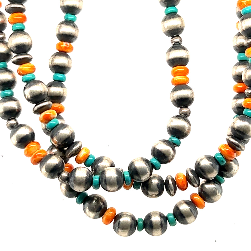 A Handcrafted Native American Beaded Necklace by Super Silver on a white background.