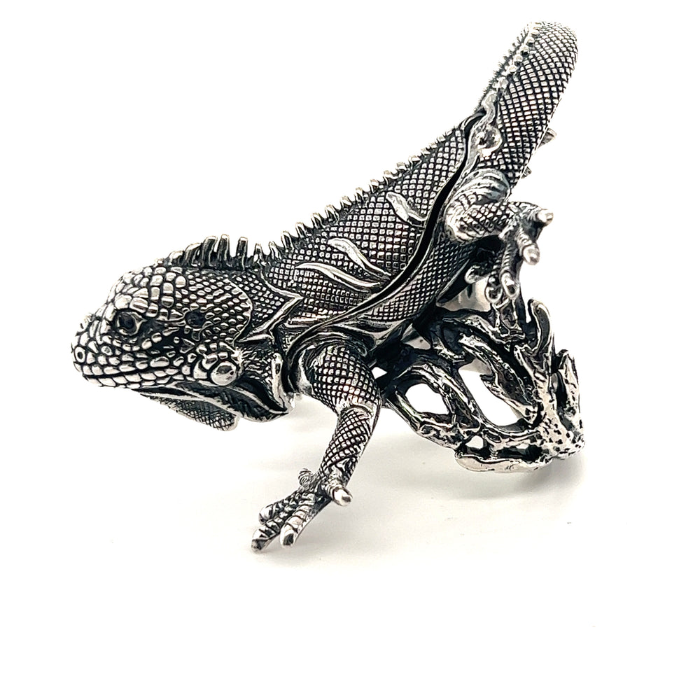 A designer Handcrafted Iguana Ring adorned with a stunning iguana motif, crafted in silver.