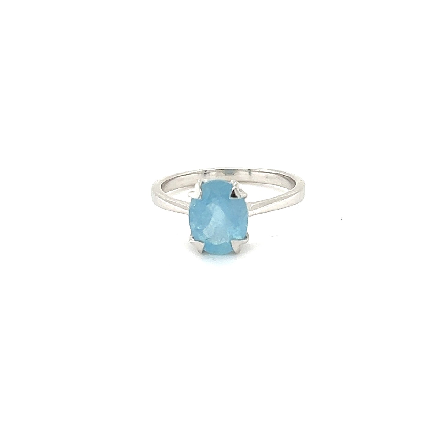 
                  
                    A Super Silver aquamarine ring with a blue topaz on a white background.
                  
                