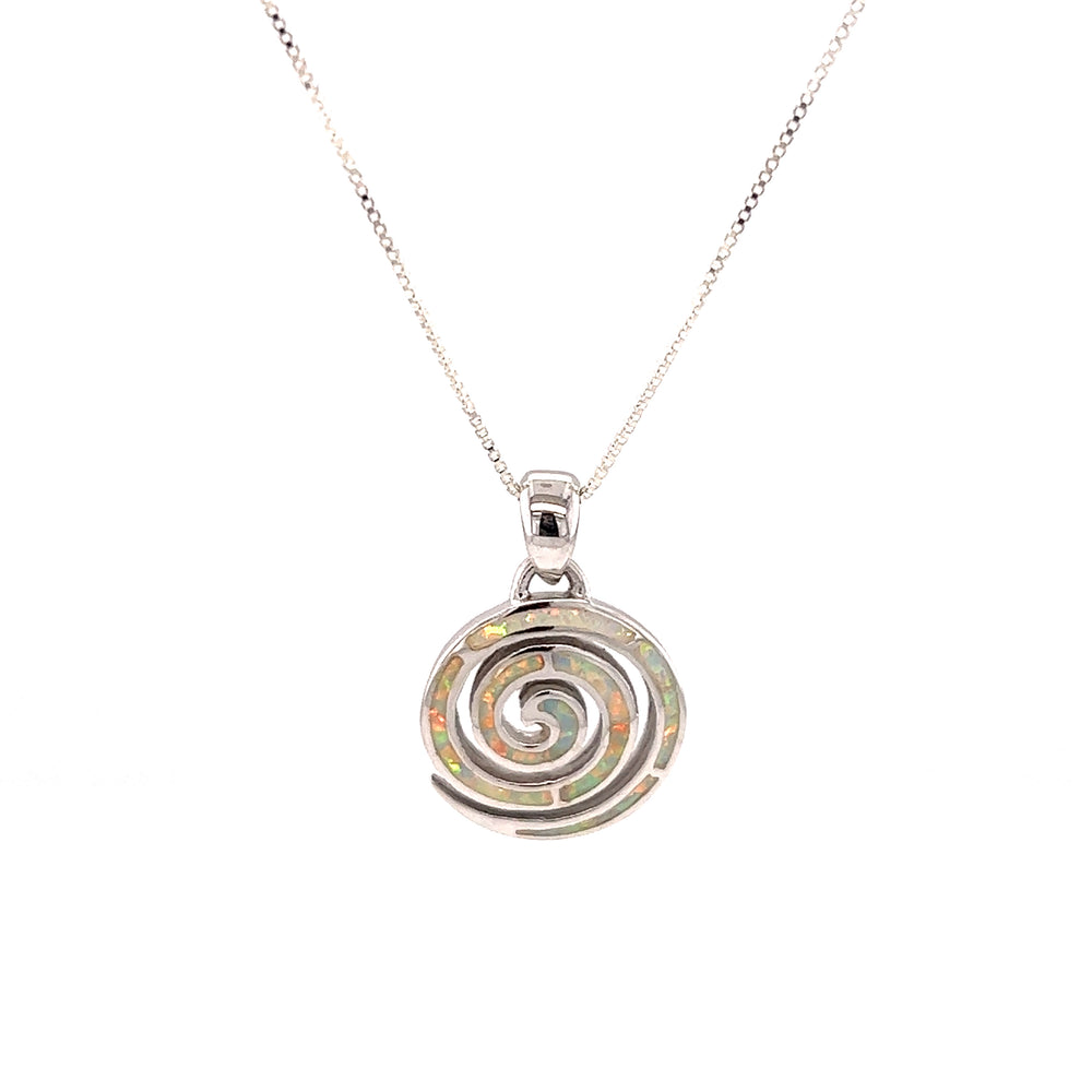 
                  
                    A Super Silver Opal Spiral Pendant, adorned with an opal.
                  
                