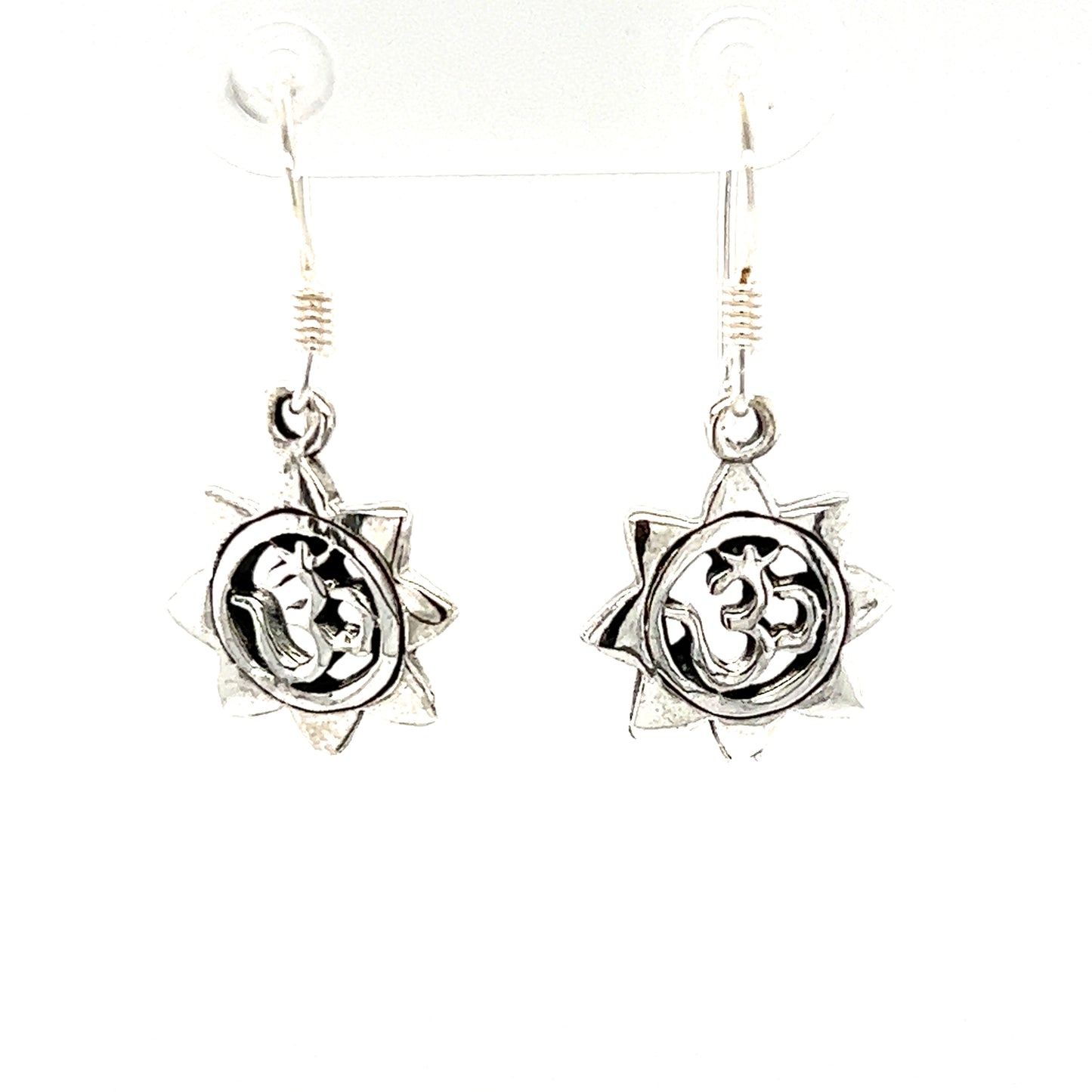 A pair of Super Silver Om With Sun Earrings.