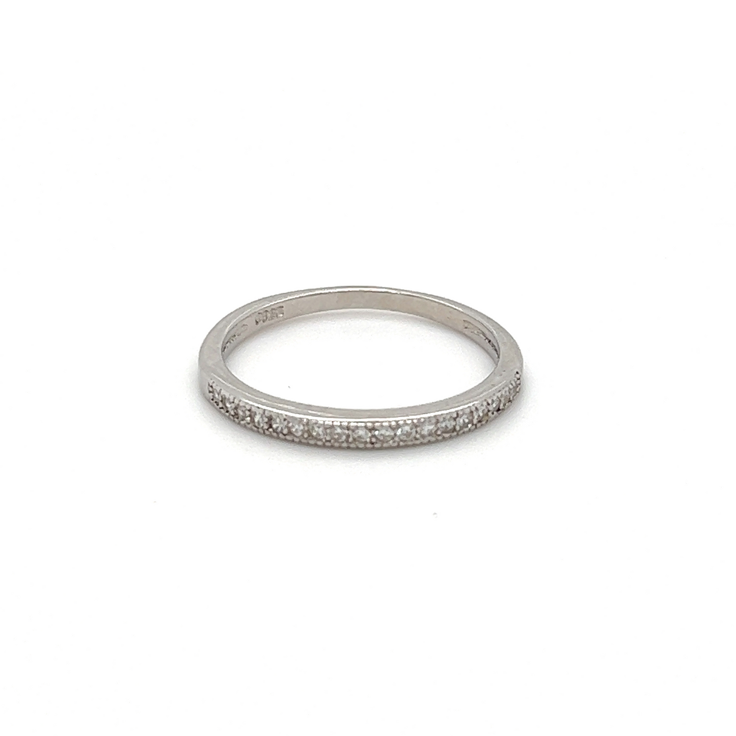 
                  
                    An elegant Classic Pave Cubic Zirconia Eternity Ring embedded with diamonds.
                  
                