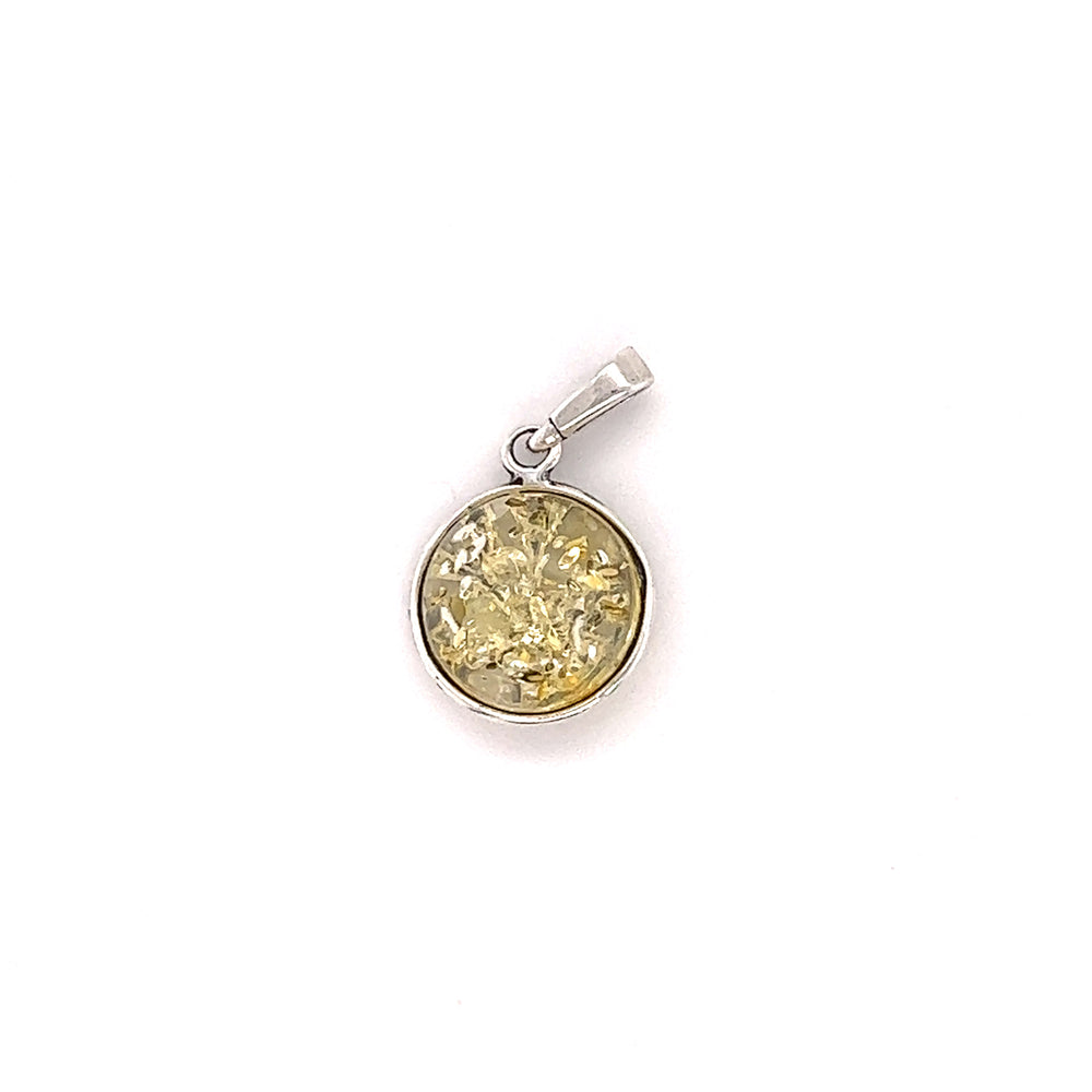 
                  
                    A handmade Super Silver Charming Tree Of Life Lemon Amber Pendant with a yellow stone in the shape of a tree of life.
                  
                
