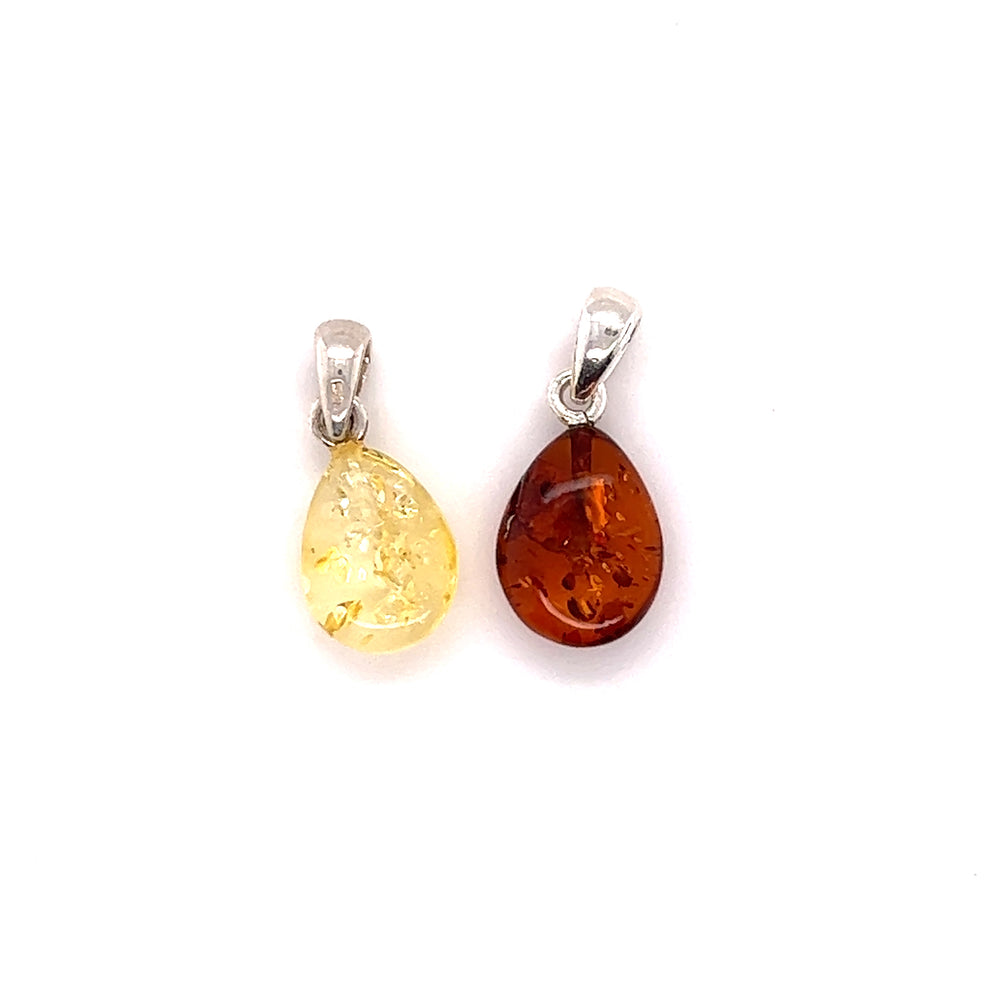 A Teardrop Amber Pendant made of Baltic amber, showcased on a clean white background by Super Silver.