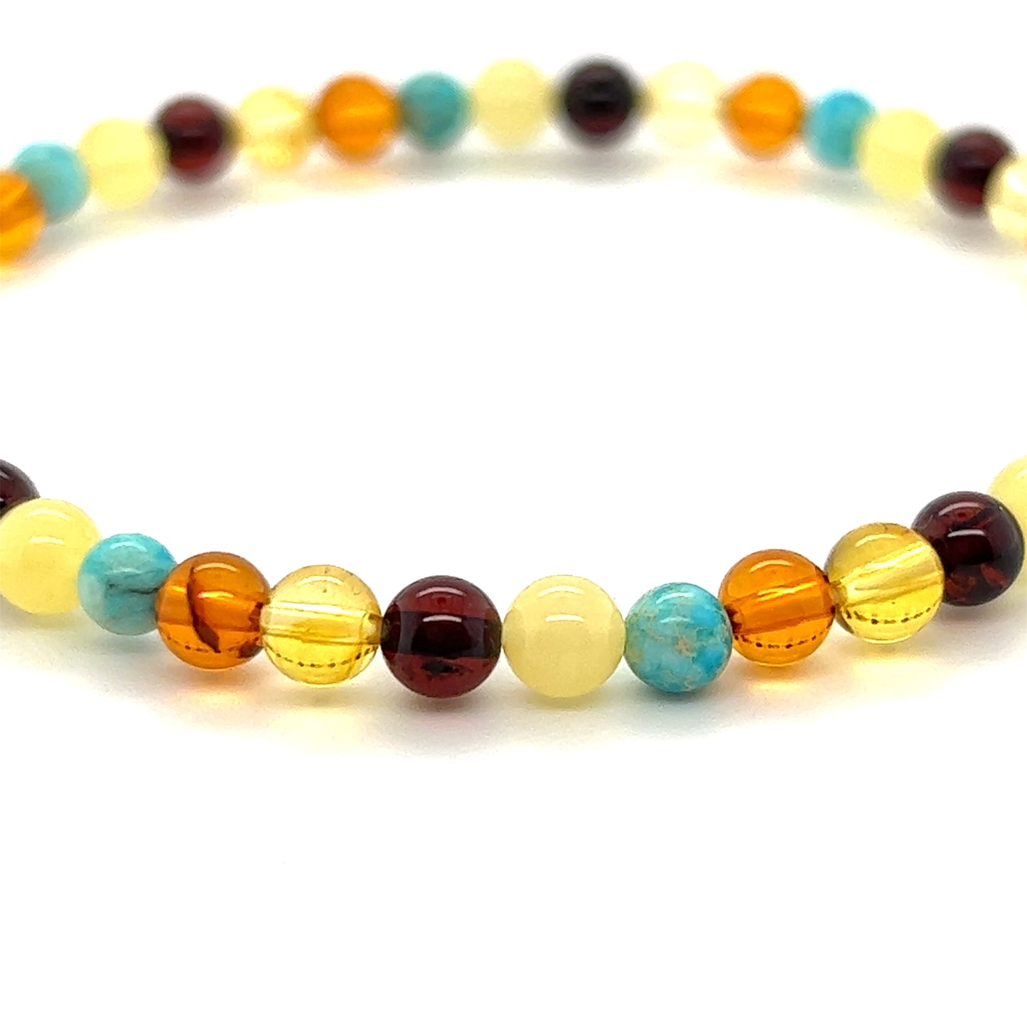A Multicolored Amber Beaded Bracelet with Turquoise beads by Super Silver.