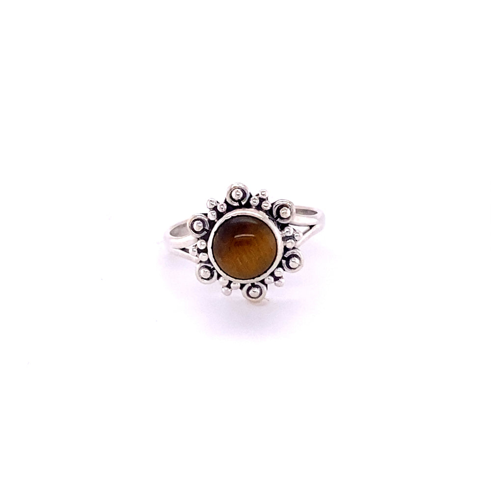 
                  
                    A Beautiful Round Flower Ring with Natural Gemstones from Super Silver featuring a tiger eye cabochon.
                  
                