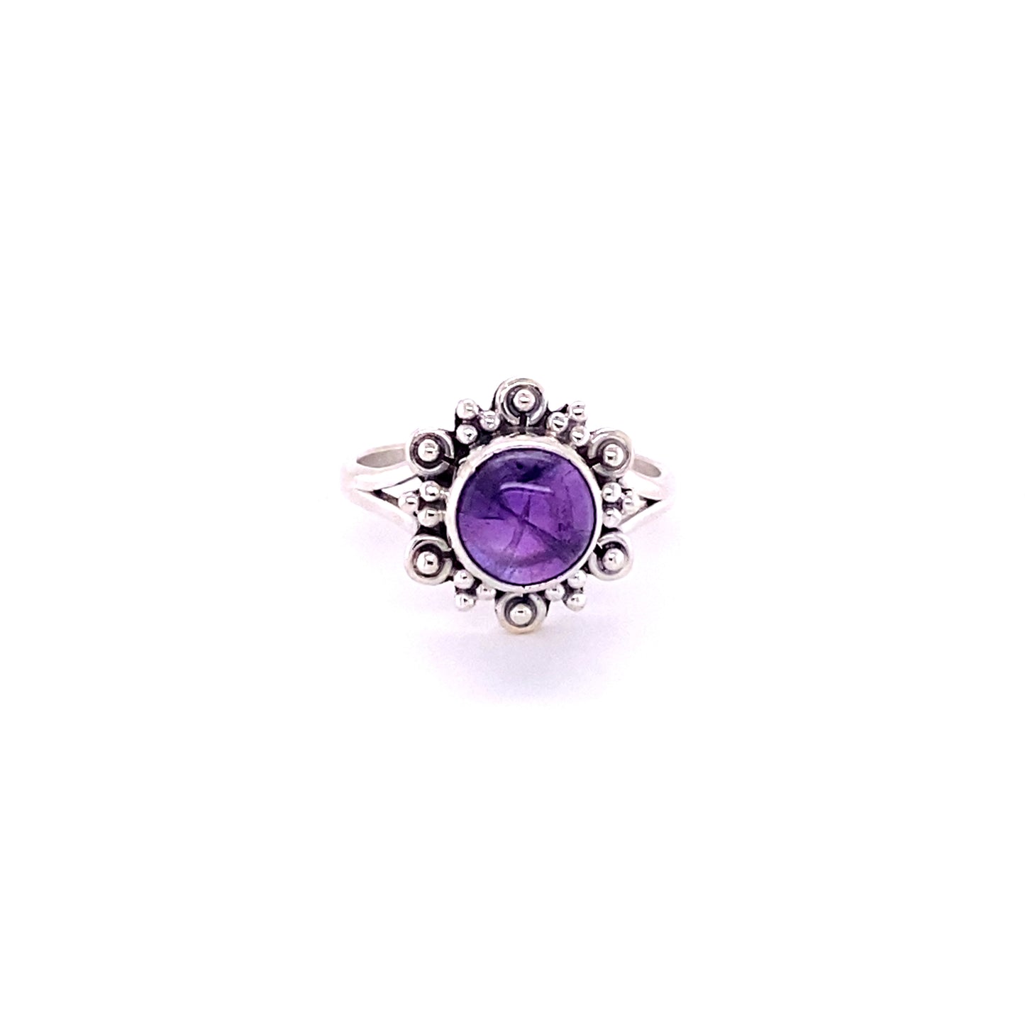 
                  
                    A Beautiful Round Flower Ring with Natural Gemstones featuring an amethyst cabochon on a white background by Super Silver.
                  
                