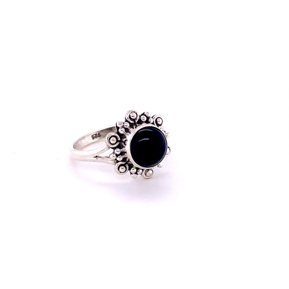 
                  
                    A Beautiful Round Flower Ring with Natural Gemstones with a stone.
                  
                