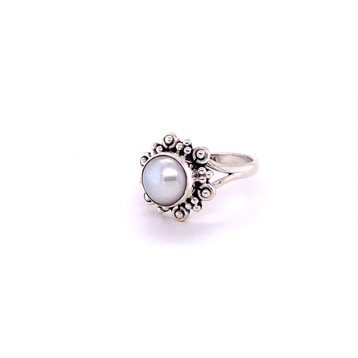 
                  
                    A Beautiful Round Flower Ring with Natural Gemstones on a white background.
                  
                