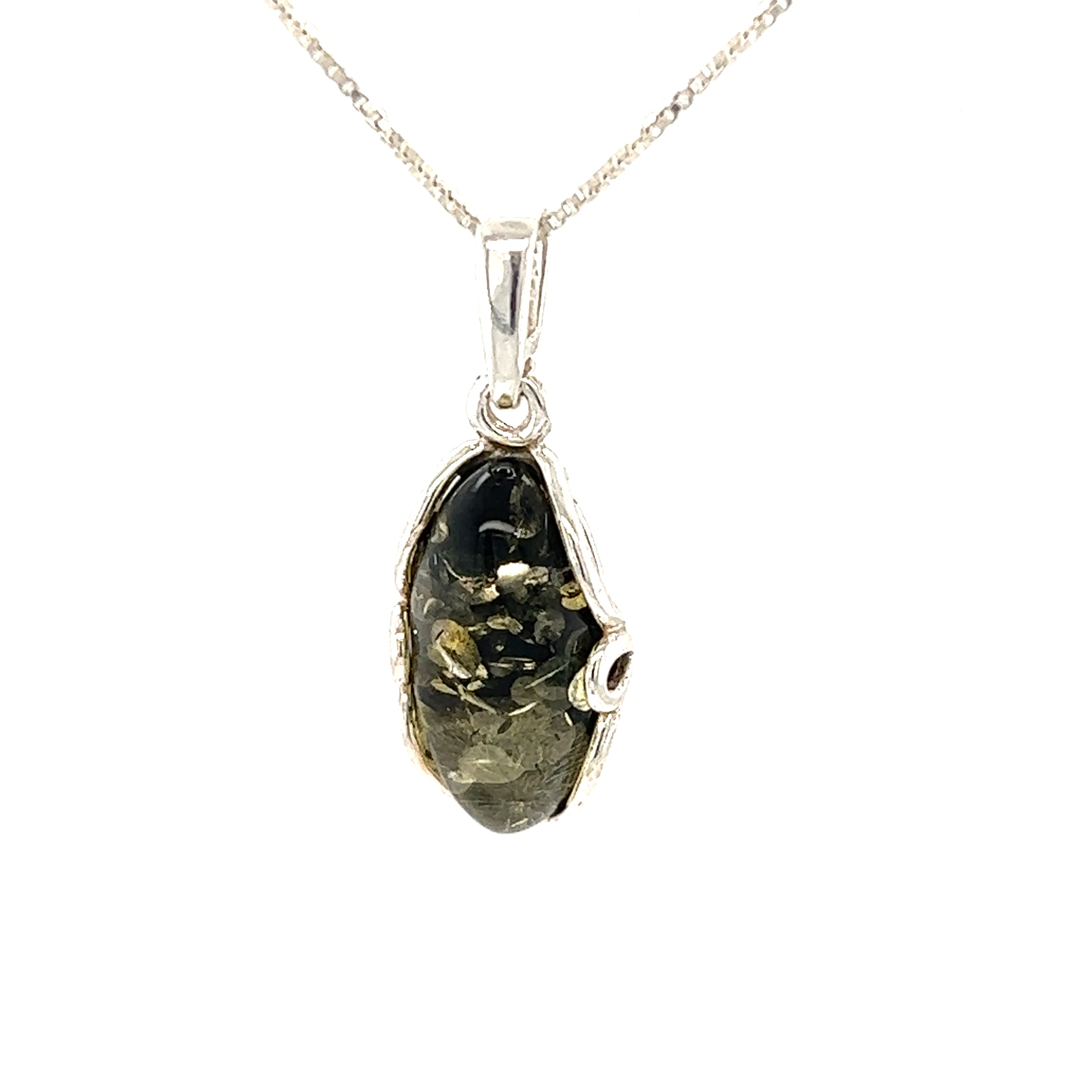A Charming Oval Amber Pendant with a sparkling black stone on a Super Silver chain.