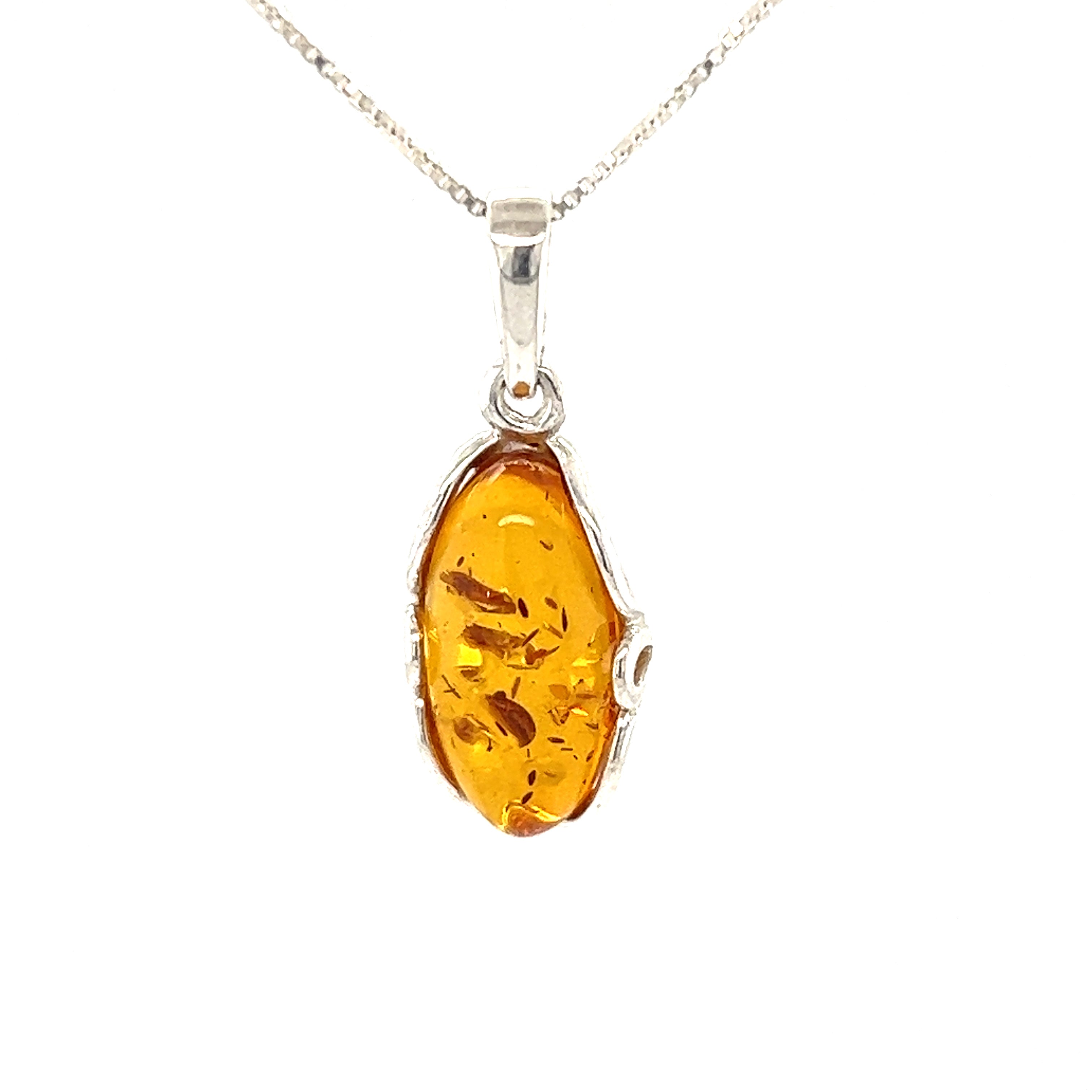 Charming Oval Amber Pendant by Super Silver.