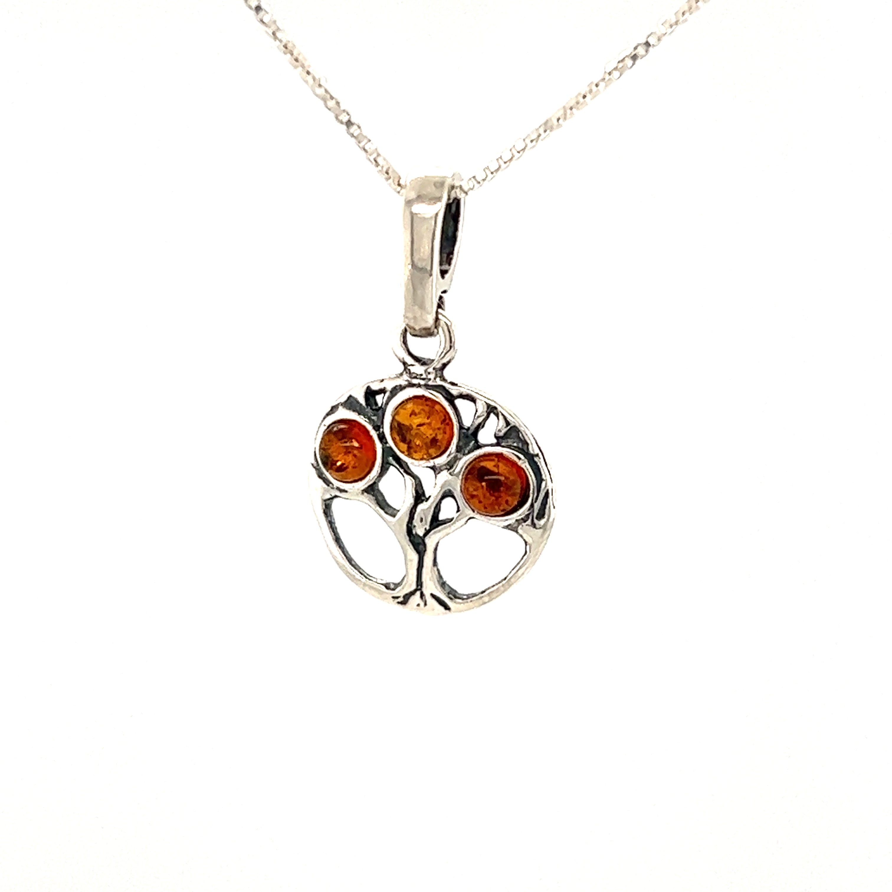 A Super Silver Dainty Amber Tree of Life Pendant adorned with Baltic amber stones, perfect for those seeking an elegant Amber pendant.