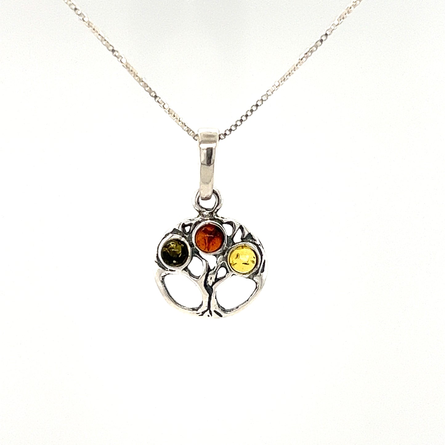 A beautiful Super Silver Dainty Amber Tree of Life Pendant necklace with Baltic amber stones.