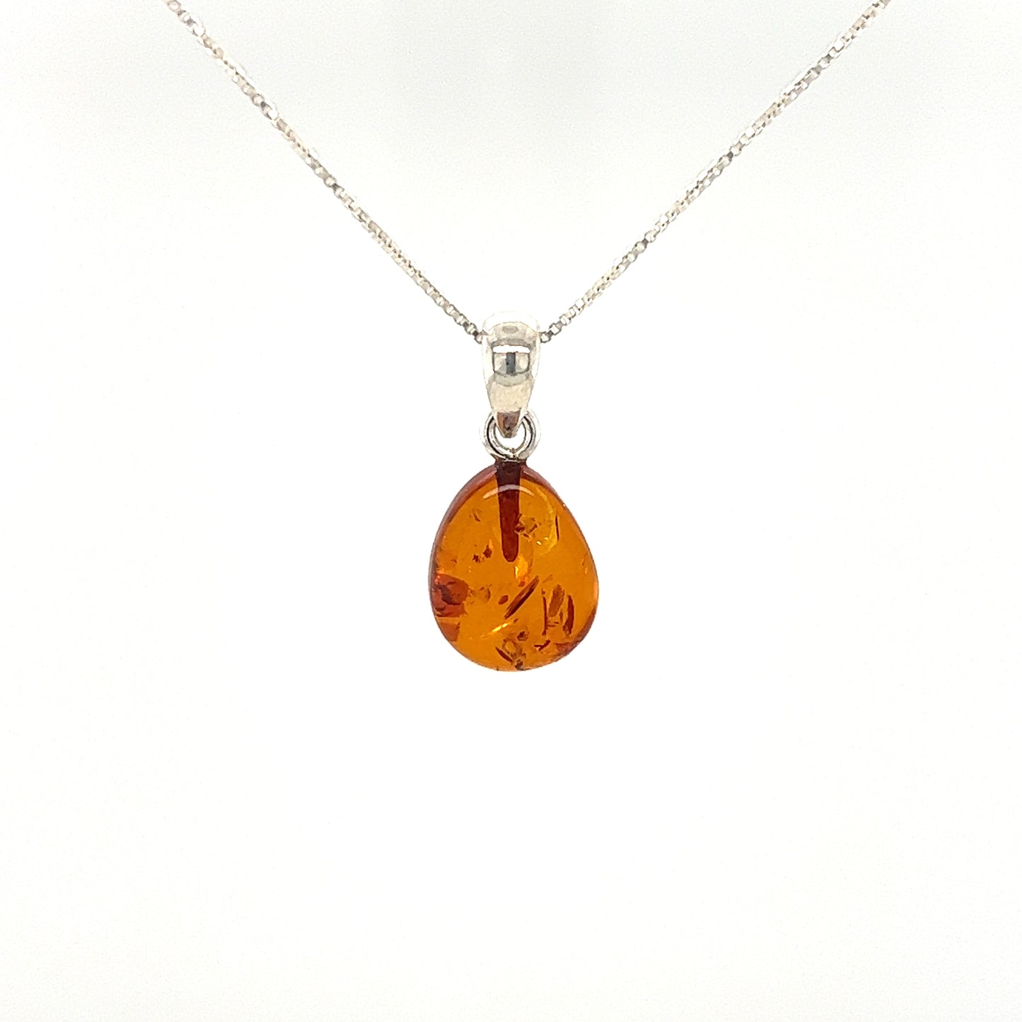 Super Silver's Teardrop Amber Pendant, with a minimalist look, in sterling silver.